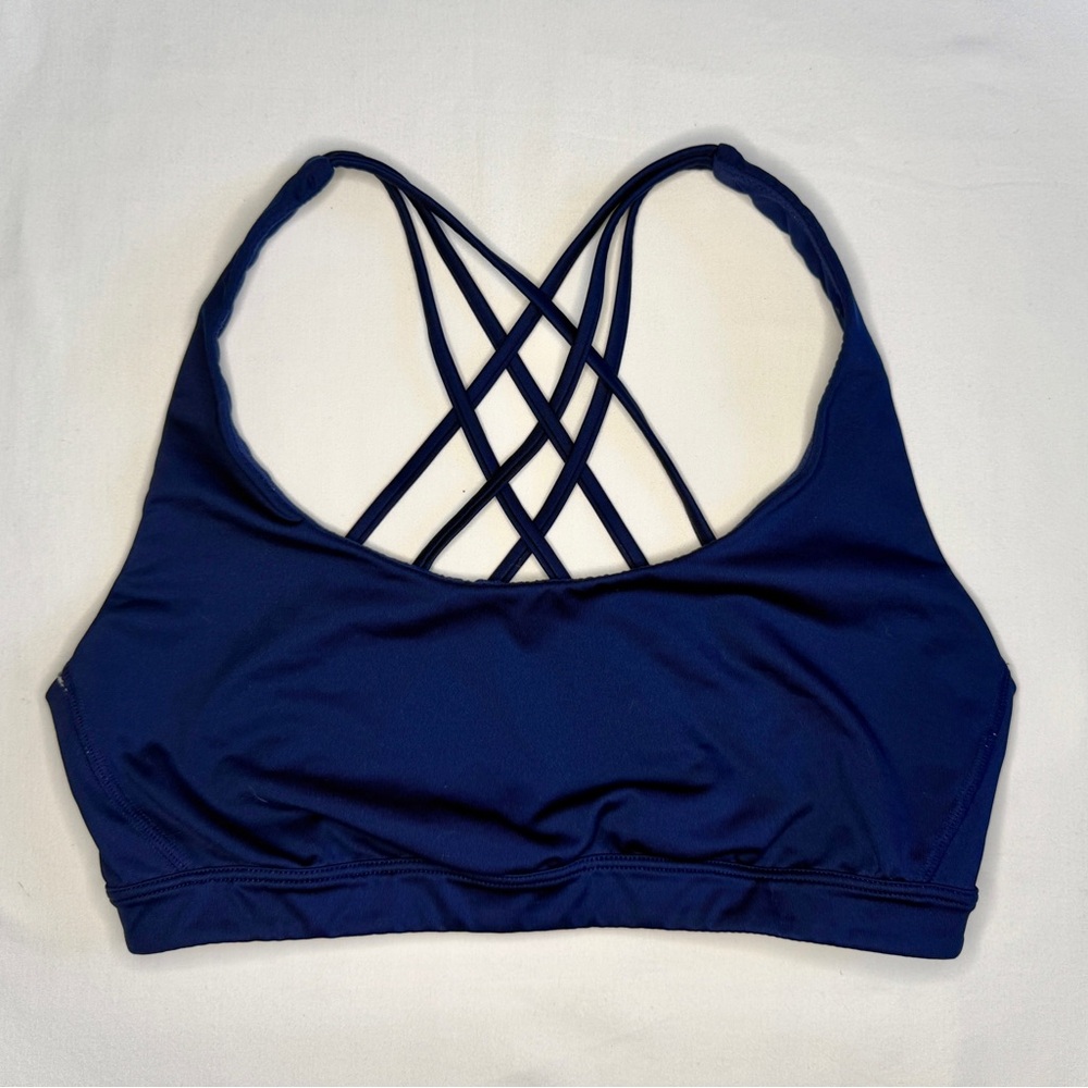 Victoria’s Secret navy sports bra with criss cross back